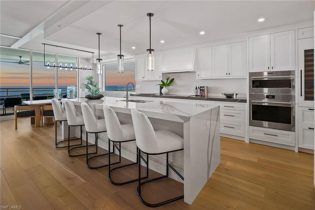 13935 Old Coast Road, Unit 2206 Naples, FL 34110 - Photo 1 of 50 Five-star Kalea Bay pet friendly living with rooftop pool, fitness and social spaces, plus full Club amenities and optional Beach Club - all within a 24/7 guard-gated community