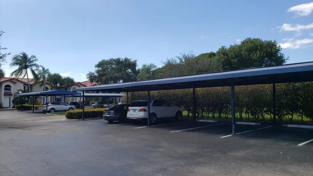 a view of a backyard with sitting area