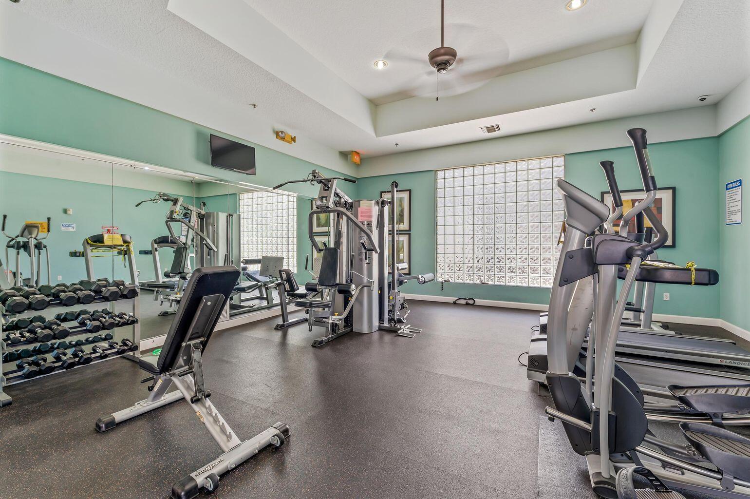 380 Northwest 67th Street, Unit 207 Boca Raton, FL 33487 - Photo 25 of 34 a view of a room with gym equipment