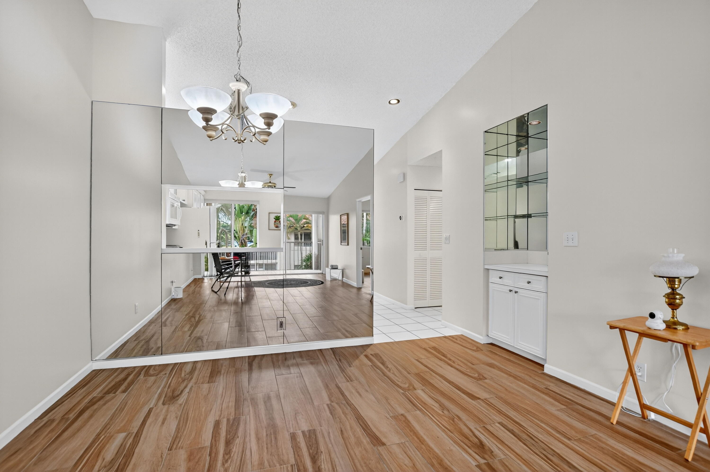 380 Northwest 67th Street, Unit 207 Boca Raton, FL 33487 - Photo 7 of 34 a view of a kitchen and dining room