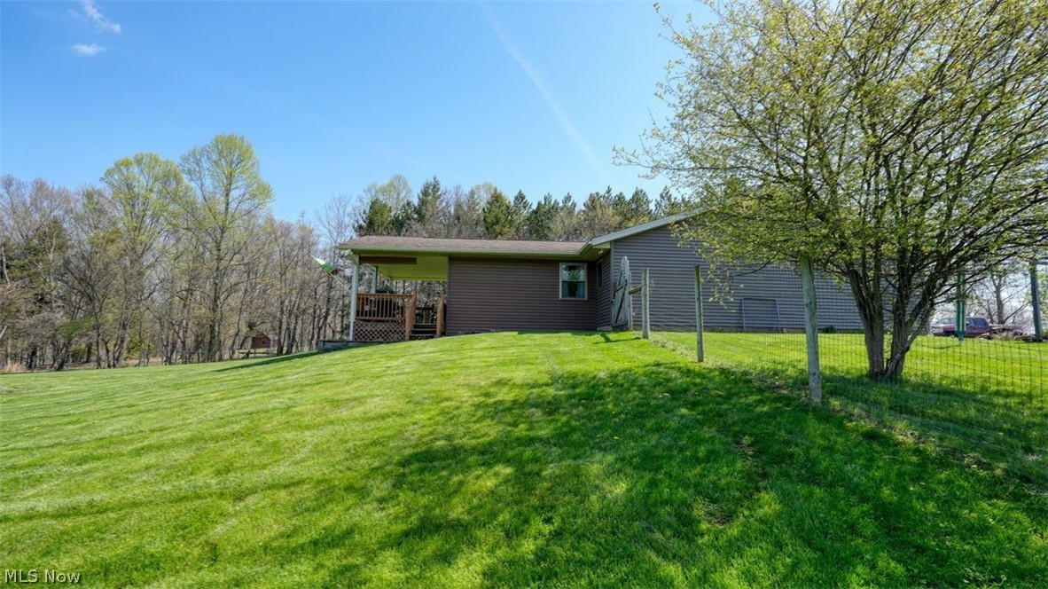 63155 Arrowhead Road Cambridge, OH 43725 - Photo 39 of 50 View of yard featuring a deck