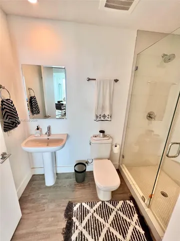 a view of a door with wooden wall