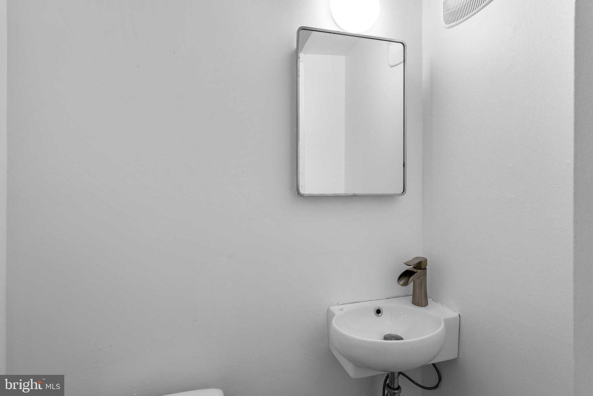 8702 Manchester Road, Unit 8 Silver Spring, MD 20901 - Photo 13 of 23 1st Floor Powder Room