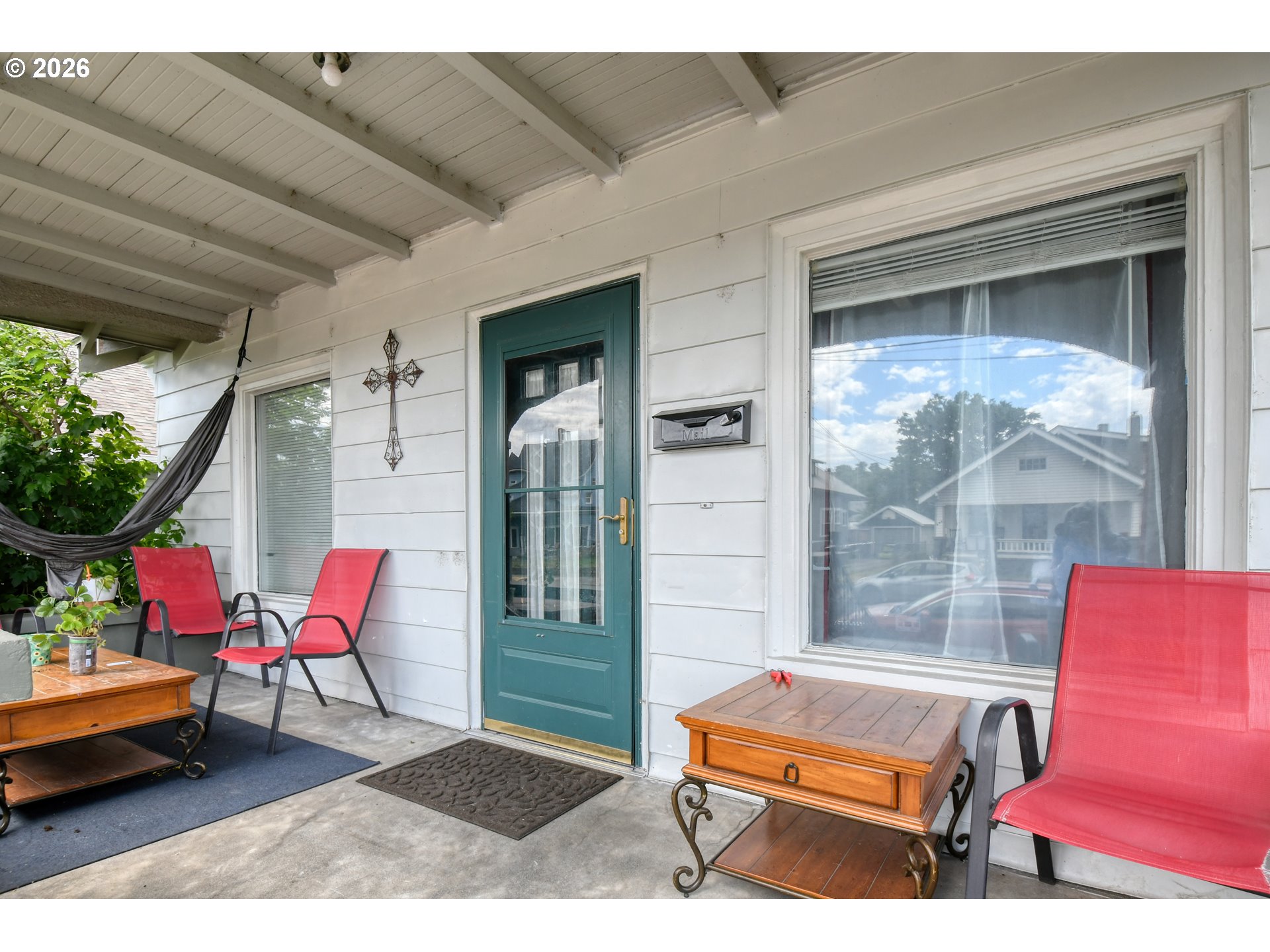 607 Southwest Court Avenue Pendleton, OR 97801 - Photo 5 of 48 a outdoor living space with furniture and a potted plant