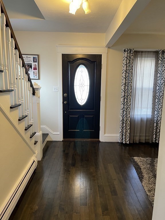 9 Thayer Street Worcester, MA 01603 - Photo 17 of 18 a view of an entryway with wooden floor