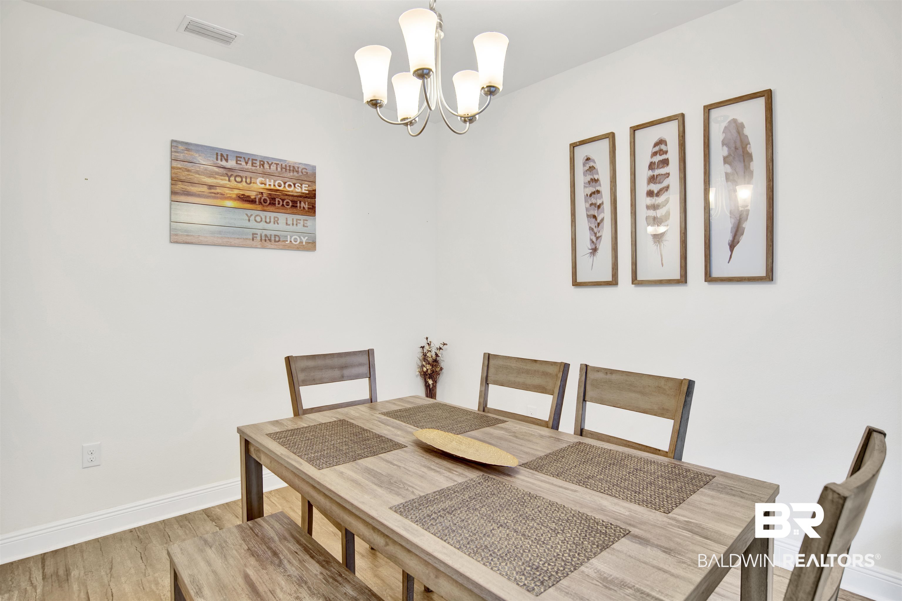 1468 Surrey Loop Foley, AL 36535 - Photo 4 of 28 Dining room with a chandelier, wood finished floors, and baseboards