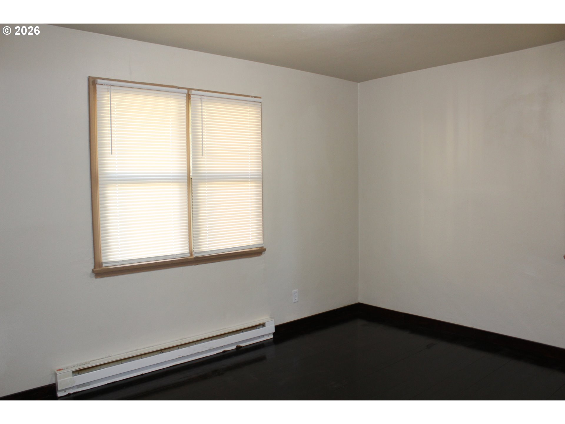 2906 East 12th Street Vancouver, WA 98661 - Photo 12 of 14 a view of an empty room with a window