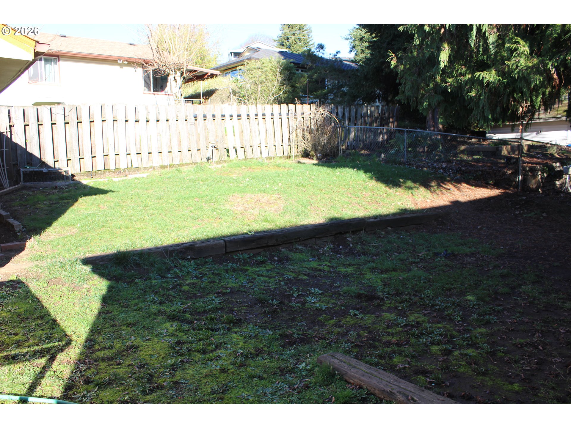 2906 East 12th Street Vancouver, WA 98661 - Photo 14 of 14 a view of a backyard with a garden