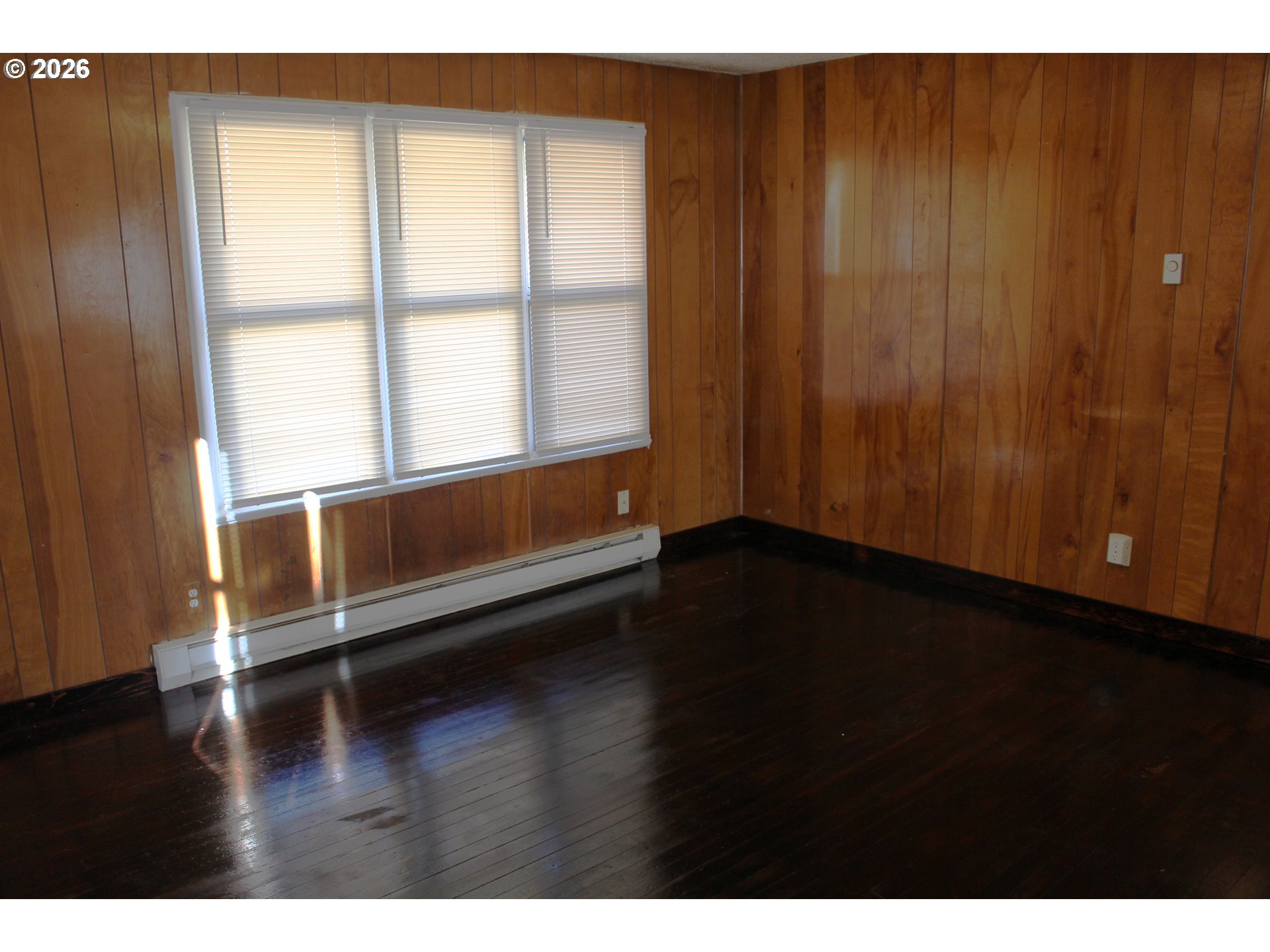 2906 East 12th Street Vancouver, WA 98661 - Photo 4 of 14 a view of wooden floor and an entryway in a room