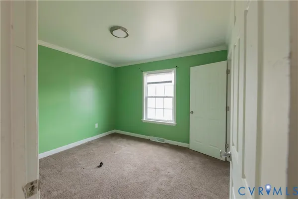 a view of room with window and ceiling fan