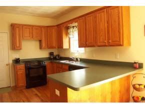 710 Entry School Road Waynesboro, VA 22980 - Photo 4 of 9 a kitchen with stainless steel appliances granite countertop a granite counter tops and a view of living room