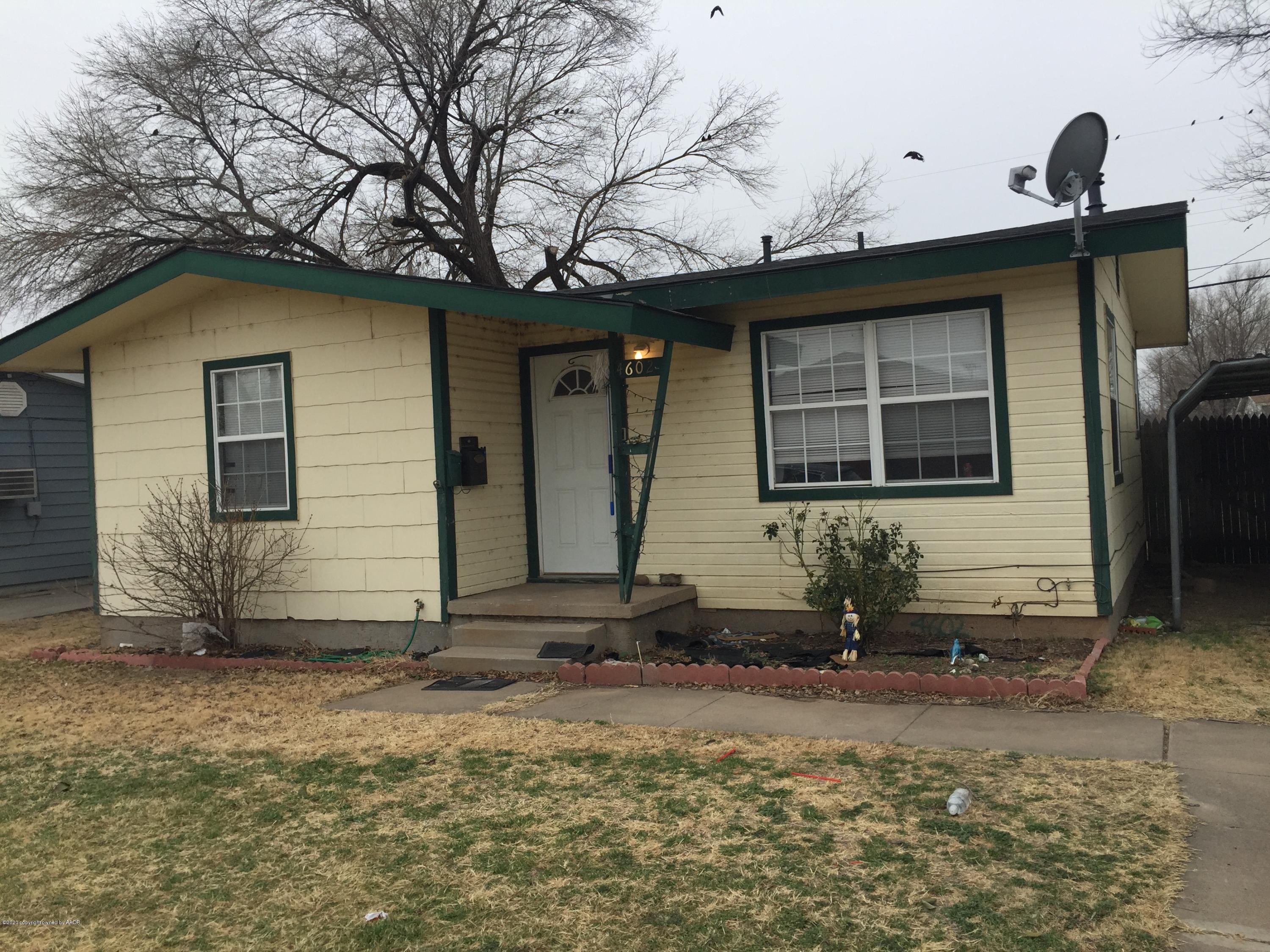 4602 South Hughes Street Amarillo, TX 79110 - Photo 1 of 7 a front view of a house with garden