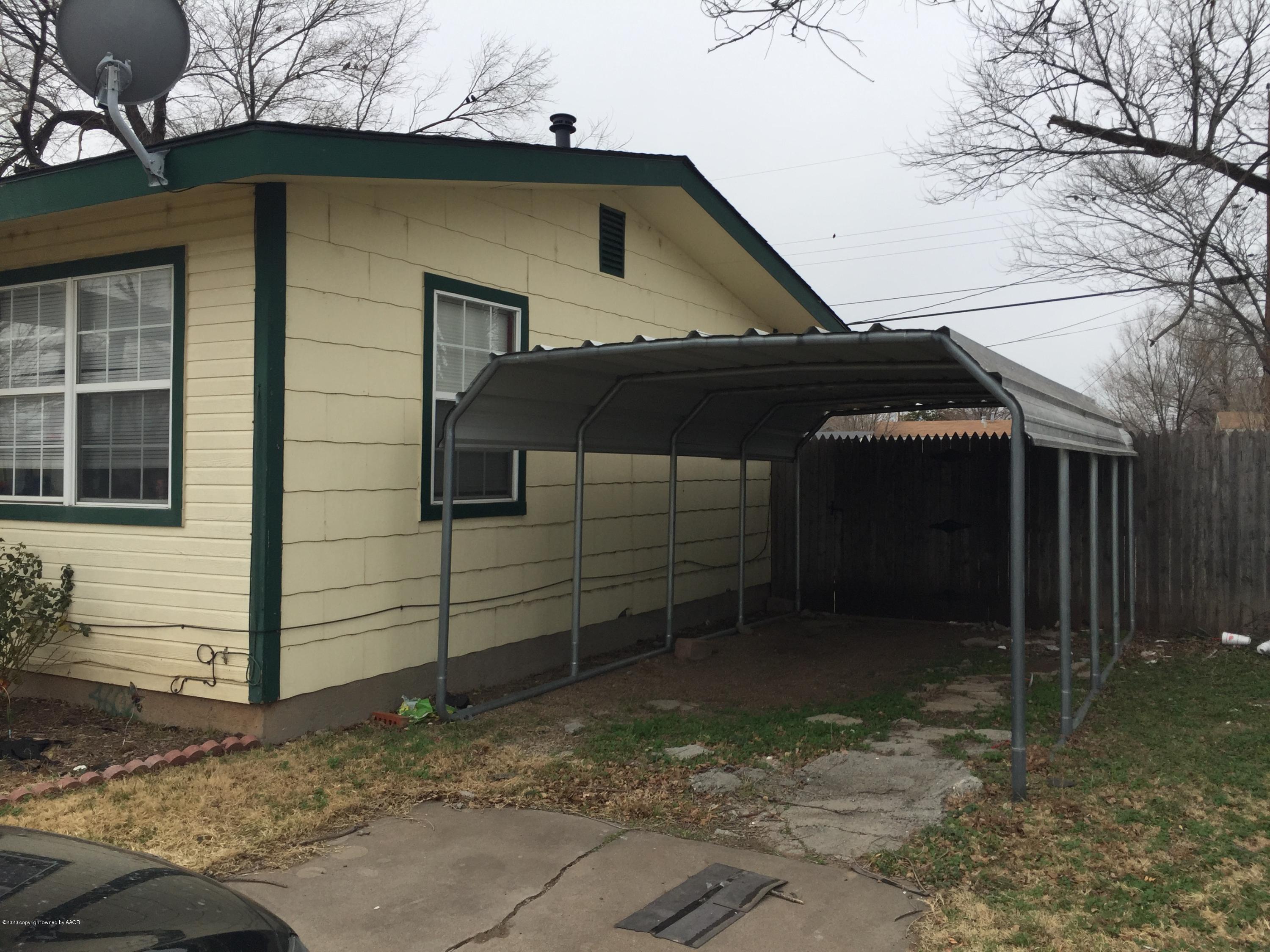 4602 South Hughes Street Amarillo, TX 79110 - Photo 2 of 7 a view of a house with a garage