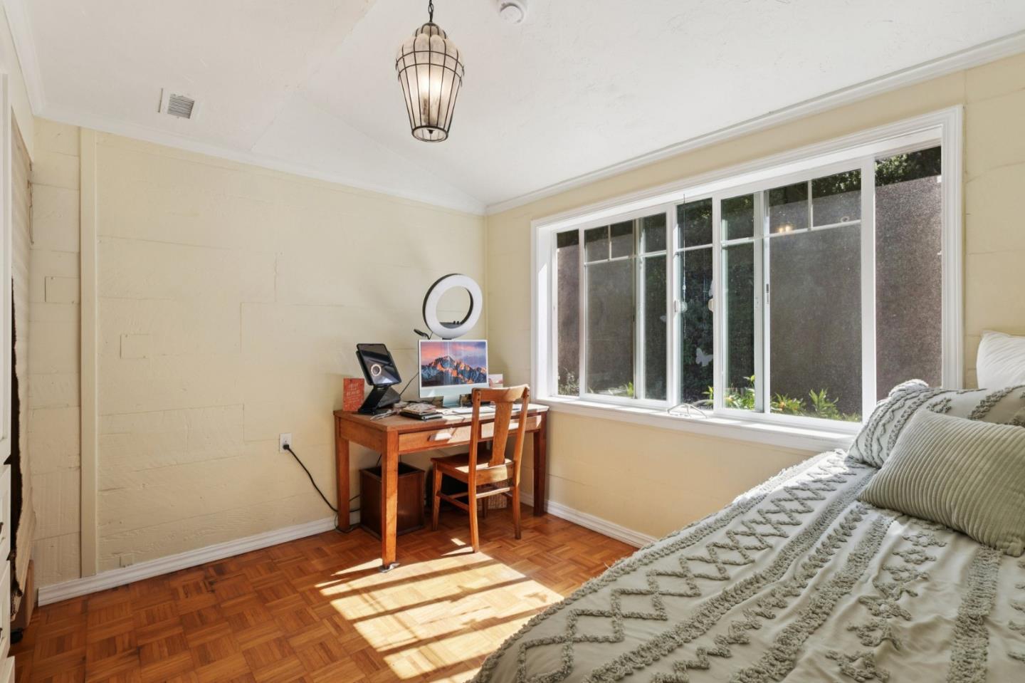 122 Strawberry Road Watsonville, CA 95076 - Photo 23 of 57 a view of a workspace with furniture and a window