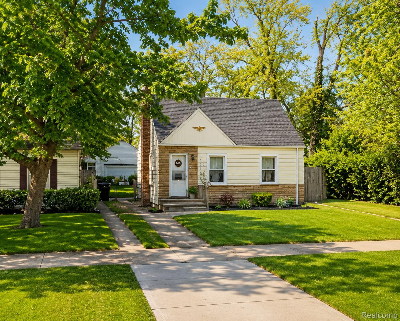 18119 Cornwall Street Detroit, MI 48224 - Photo 1 of 18 Bungalow-style residence featuring a brick and siding exterior with a prominent front chimney