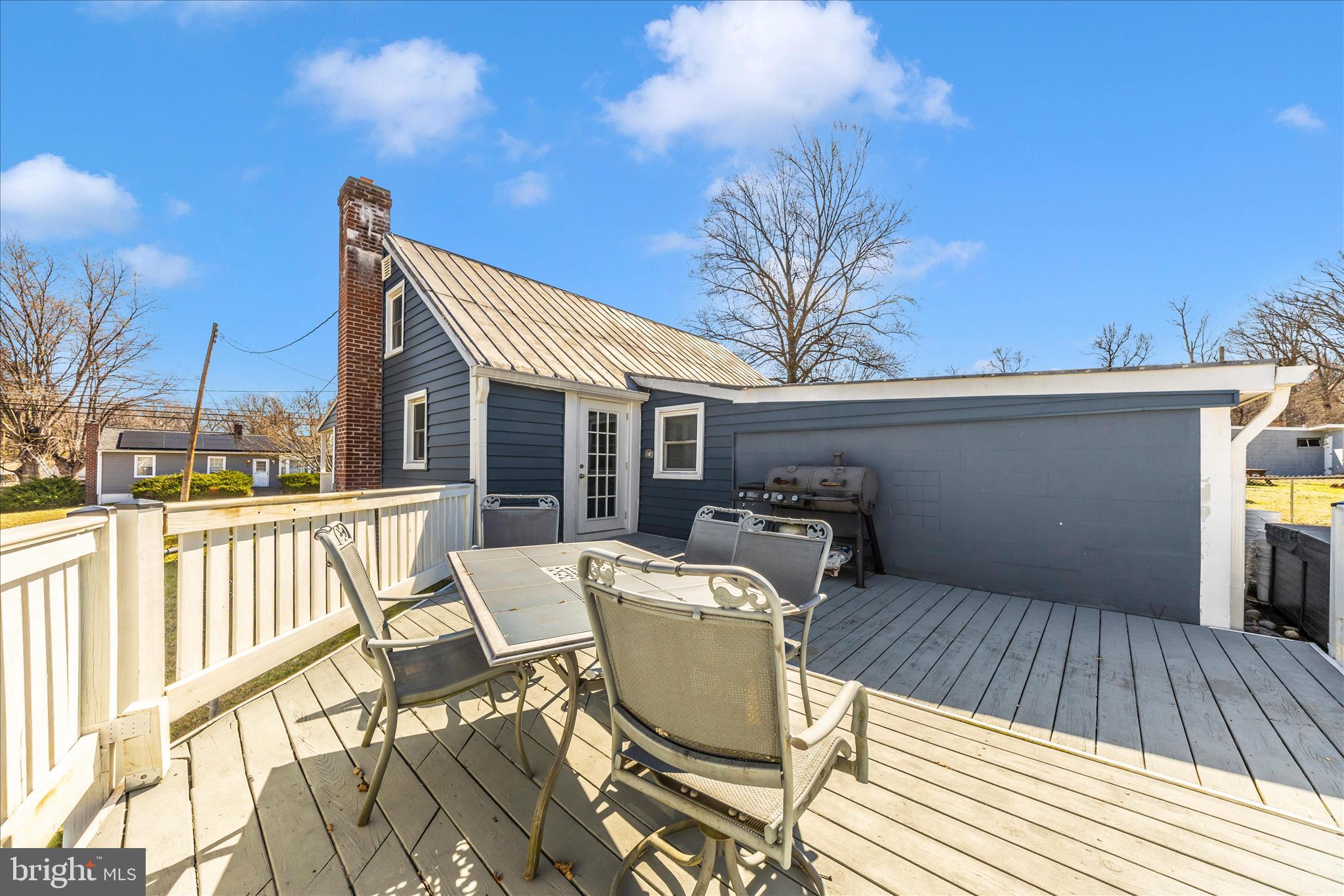 5618 Bartonsville Road Frederick, MD 21704 - Photo 50 of 53 a view of a two chairs on the roof deck