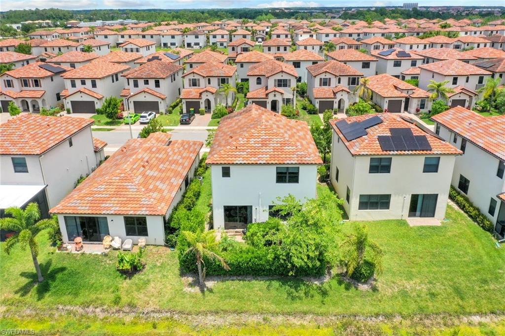 5459 Useppa Drive Ave Maria, FL 34142 - Photo 16 of 21 an aerial view of multiple houses