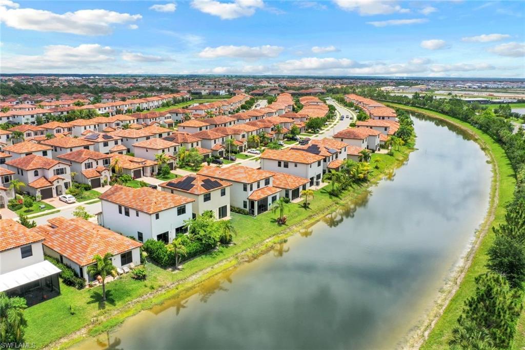 5459 Useppa Drive Ave Maria, FL 34142 - Photo 20 of 21 an aerial view of residential building with outdoor space