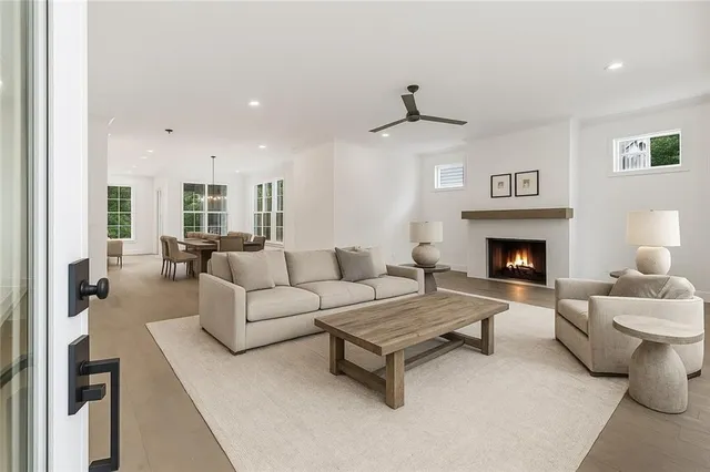 a spacious bedroom with a bed and a large window