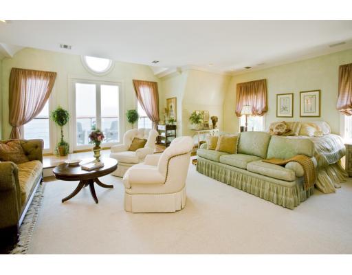 3 Anchorage Lane Marblehead, MA 01945 - Photo 13 of 16 a living room with furniture and a large window