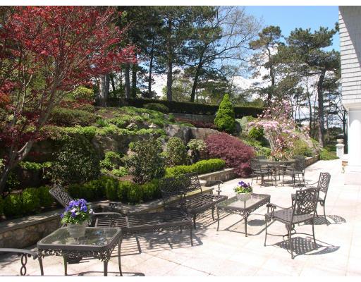 3 Anchorage Lane Marblehead, MA 01945 - Photo 4 of 16 a view of backyard with seating area and green space