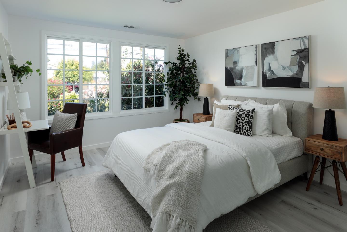 3432 Bay Road Redwood City, CA 94063 - Photo 14 of 33 a bedroom with a large bed and a window