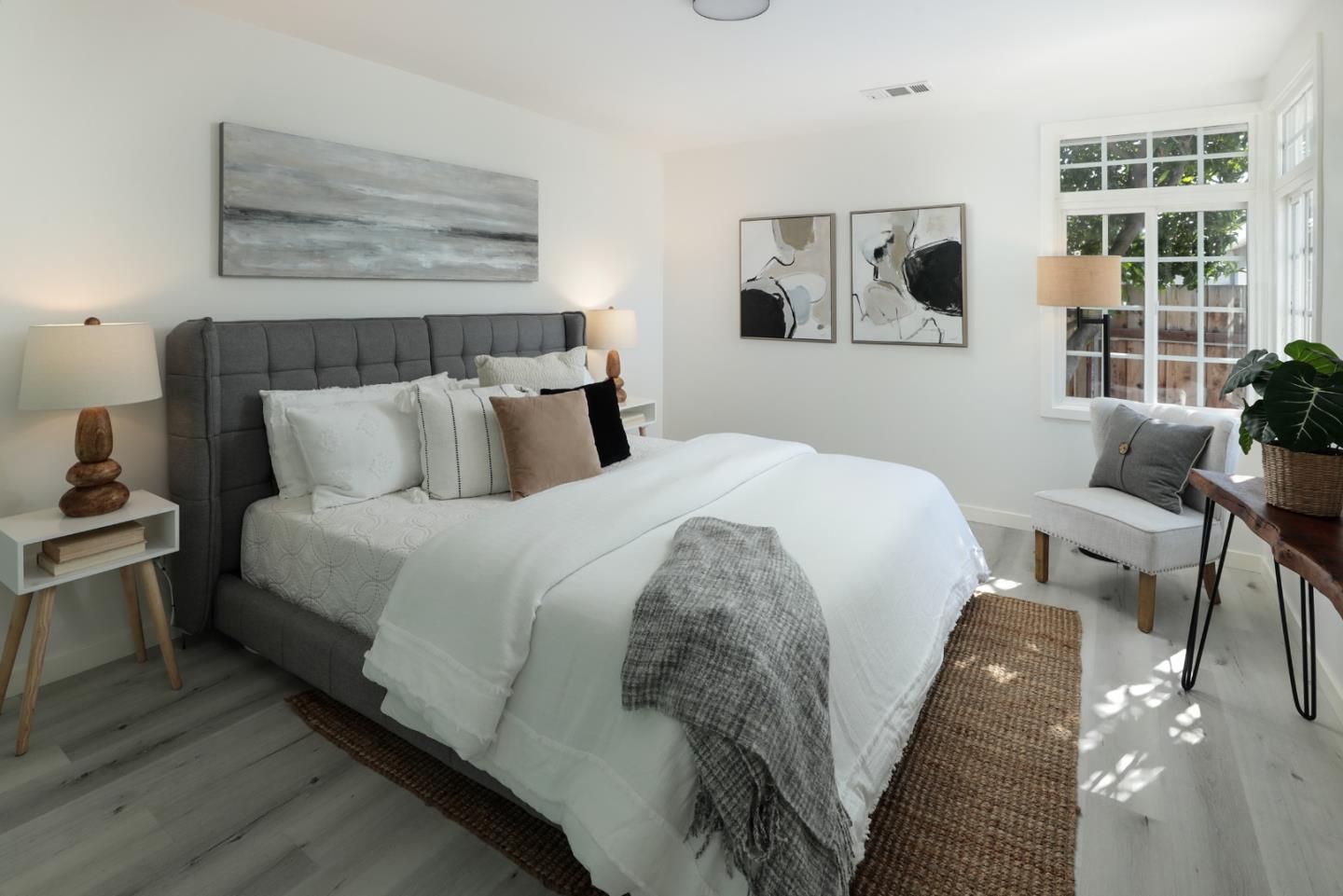 3432 Bay Road Redwood City, CA 94063 - Photo 15 of 33 a bedroom with bed and wooden floor