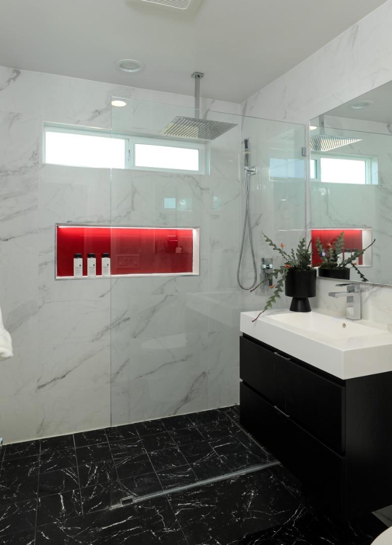 3432 Bay Road Redwood City, CA 94063 - Photo 16 of 33 a bathroom with a sink and a mirror