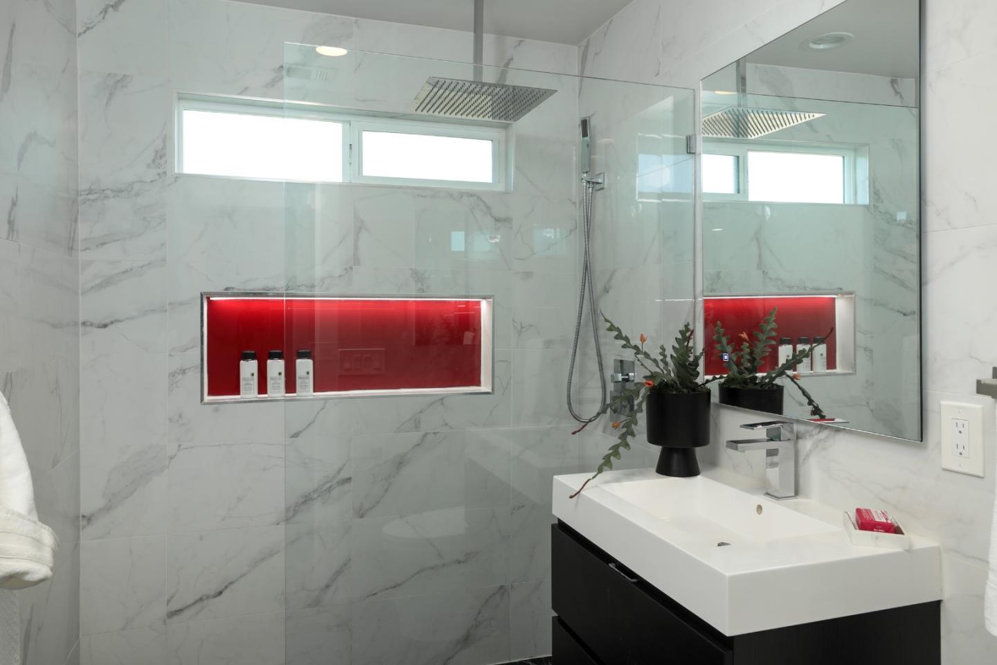 3432 Bay Road Redwood City, CA 94063 - Photo 17 of 33 a bathroom with a sink and a mirror