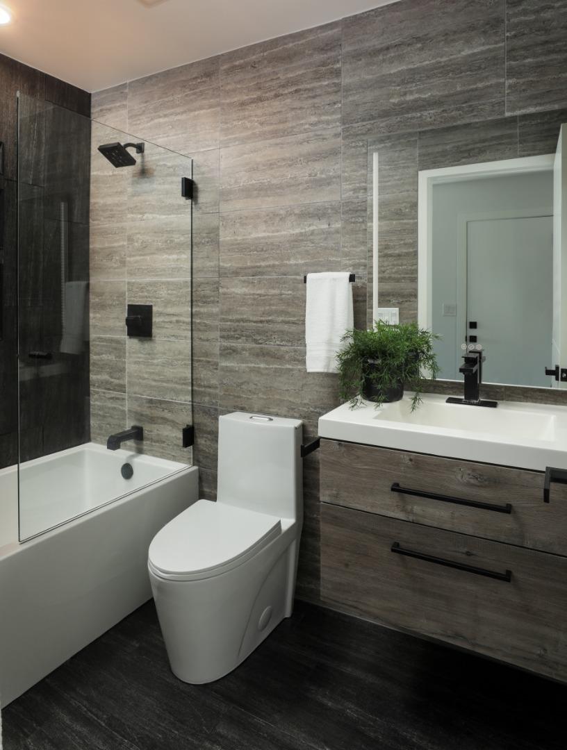 3432 Bay Road Redwood City, CA 94063 - Photo 19 of 33 a bathroom with a sink a toilet a mirror and bathtub