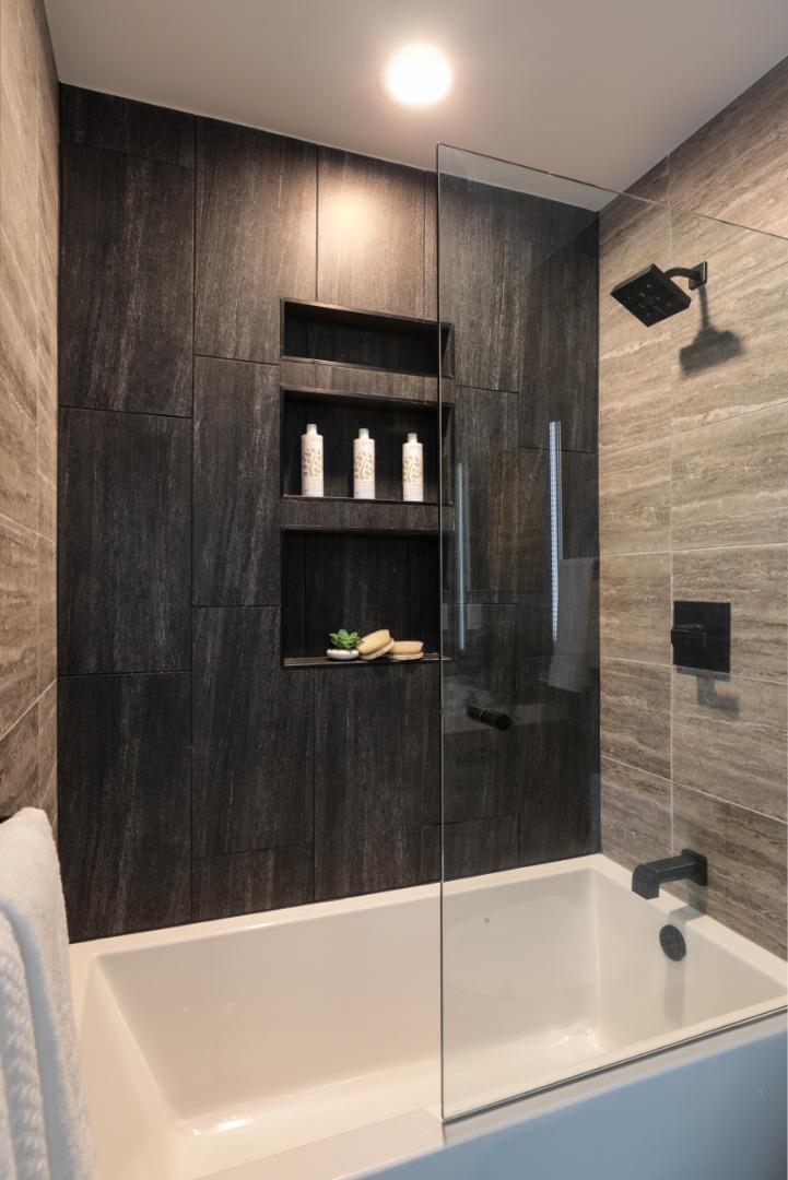 3432 Bay Road Redwood City, CA 94063 - Photo 20 of 33 a bathroom with a bathtub and a shower