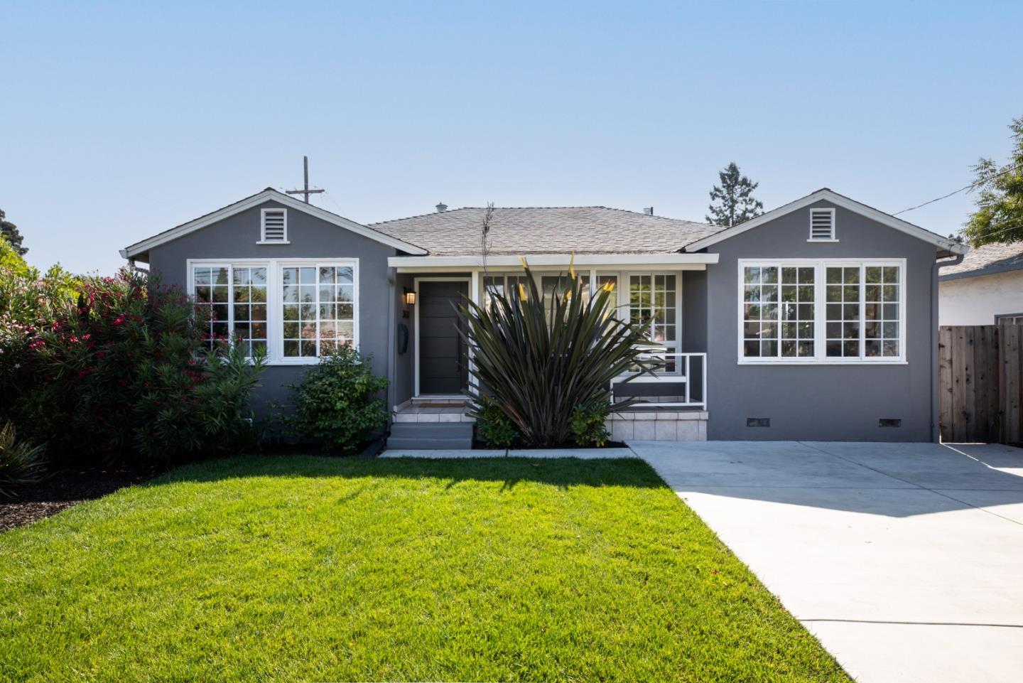 3432 Bay Road Redwood City, CA 94063 - Photo 2 of 33 a front view of a house with a yard and potted plants