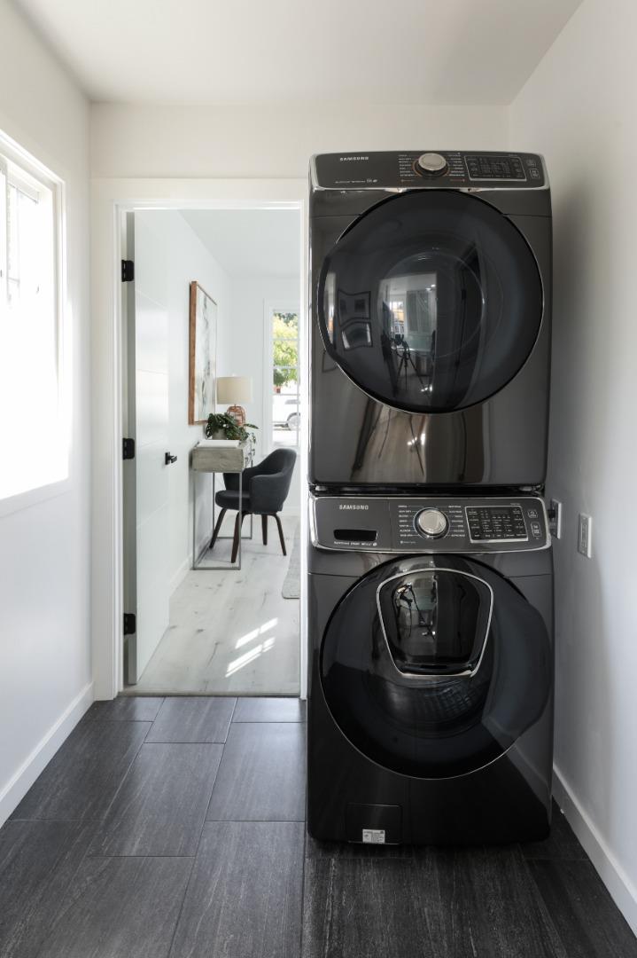 3432 Bay Road Redwood City, CA 94063 - Photo 21 of 33 a living room with furniture and a mirror