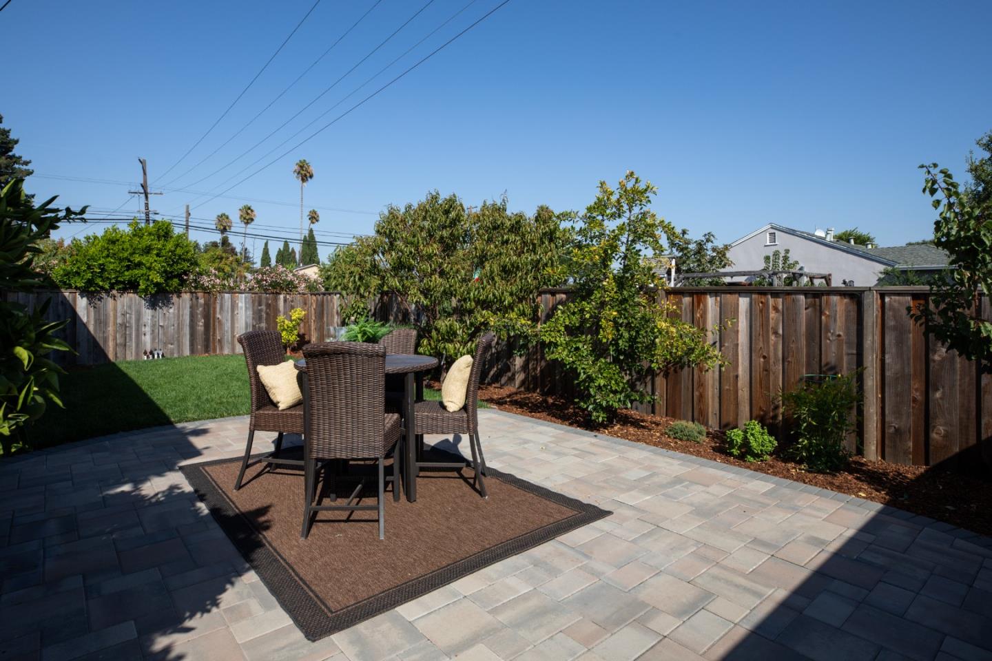 3432 Bay Road Redwood City, CA 94063 - Photo 22 of 33 a view of a tables and chairs in patio