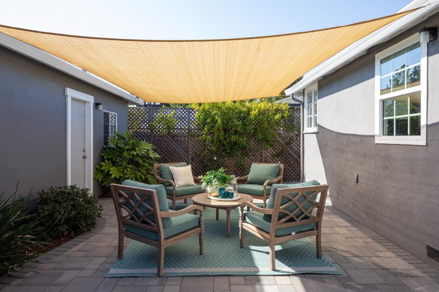 3432 Bay Road Redwood City, CA 94063 - Photo 27 of 33 a view of a patio with table and chairs and potted plants
