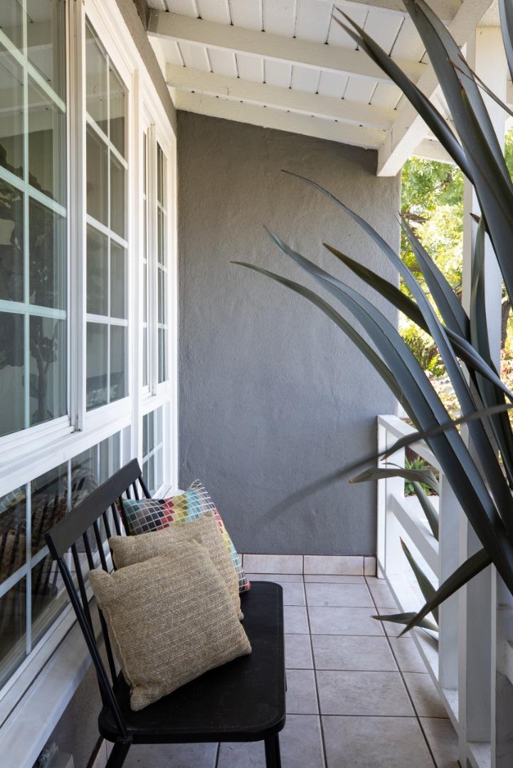 3432 Bay Road Redwood City, CA 94063 - Photo 31 of 33 a balcony with table and chairs