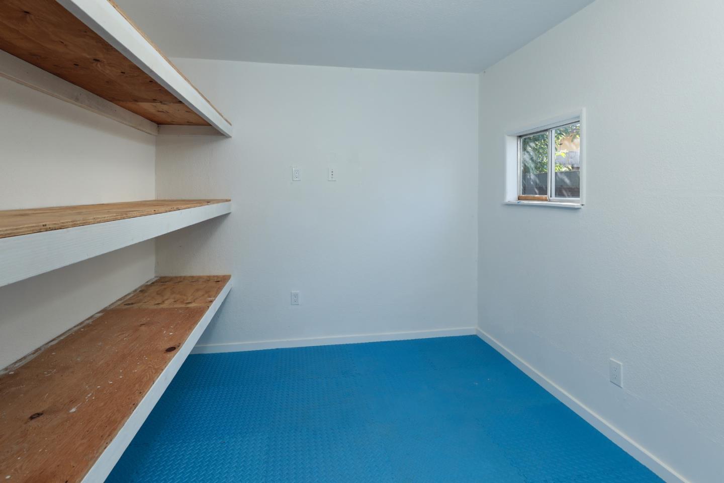 3432 Bay Road Redwood City, CA 94063 - Photo 32 of 33 a view of small space with racks on the wall