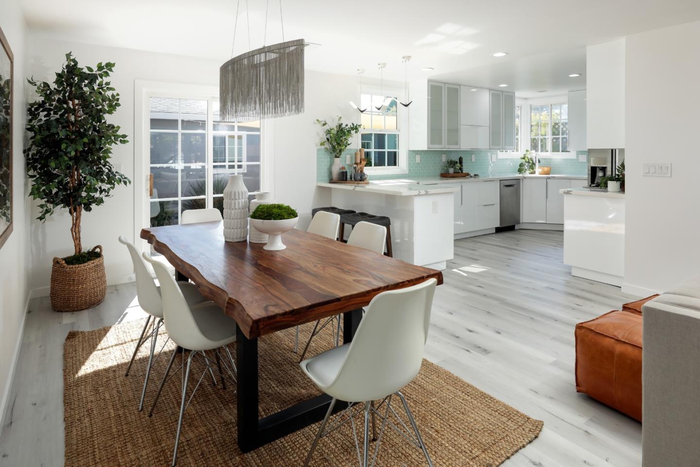 3432 Bay Road Redwood City, CA 94063 - Photo 8 of 33 a view of a dining room with furniture and wooden floor