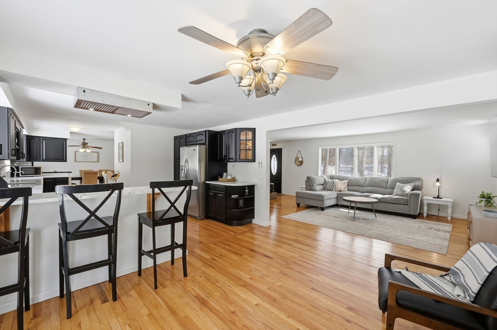 429 Moore Street Ludlow, MA 01056 - Photo 12 of 41 a view of a dining room with furniture and wooden floor