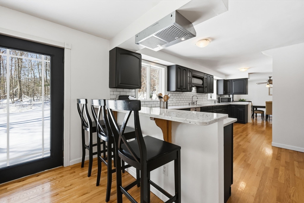 429 Moore Street Ludlow, MA 01056 - Photo 13 of 41 a view of kitchen with cabinets and wooden floor