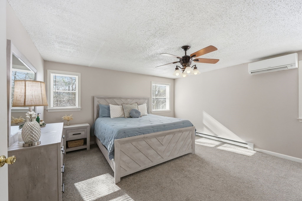 429 Moore Street Ludlow, MA 01056 - Photo 28 of 41 a bedroom with a bed and window