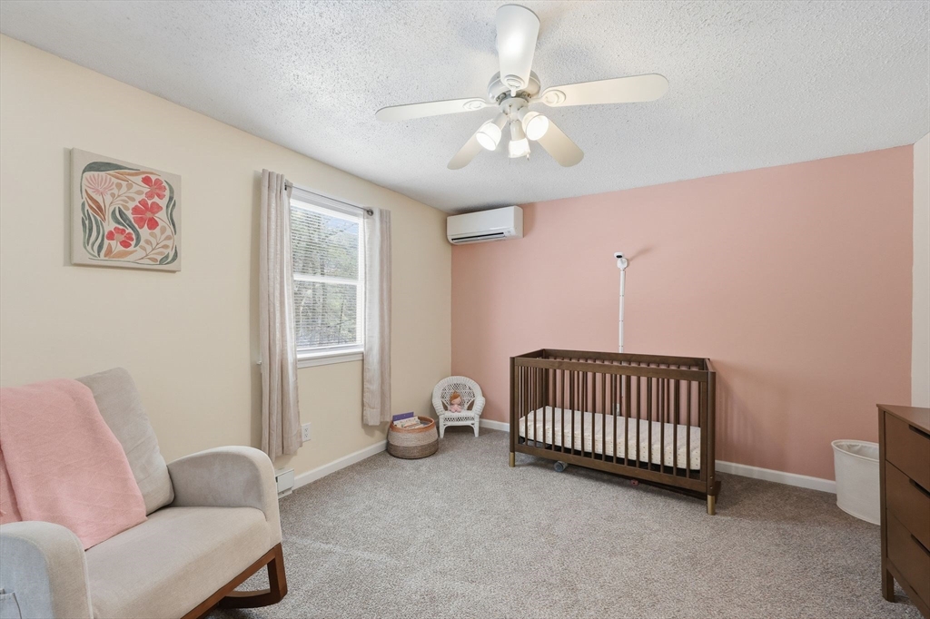 429 Moore Street Ludlow, MA 01056 - Photo 32 of 41 a bedroom with furniture and a window