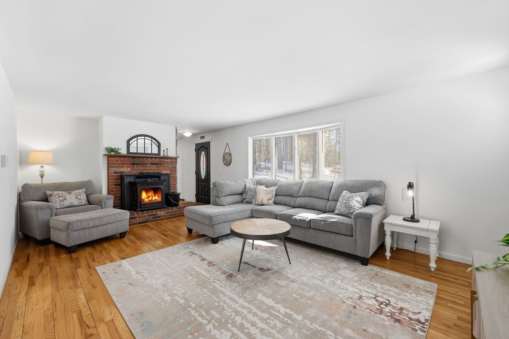 429 Moore Street Ludlow, MA 01056 - Photo 6 of 41 a living room with furniture and a fireplace