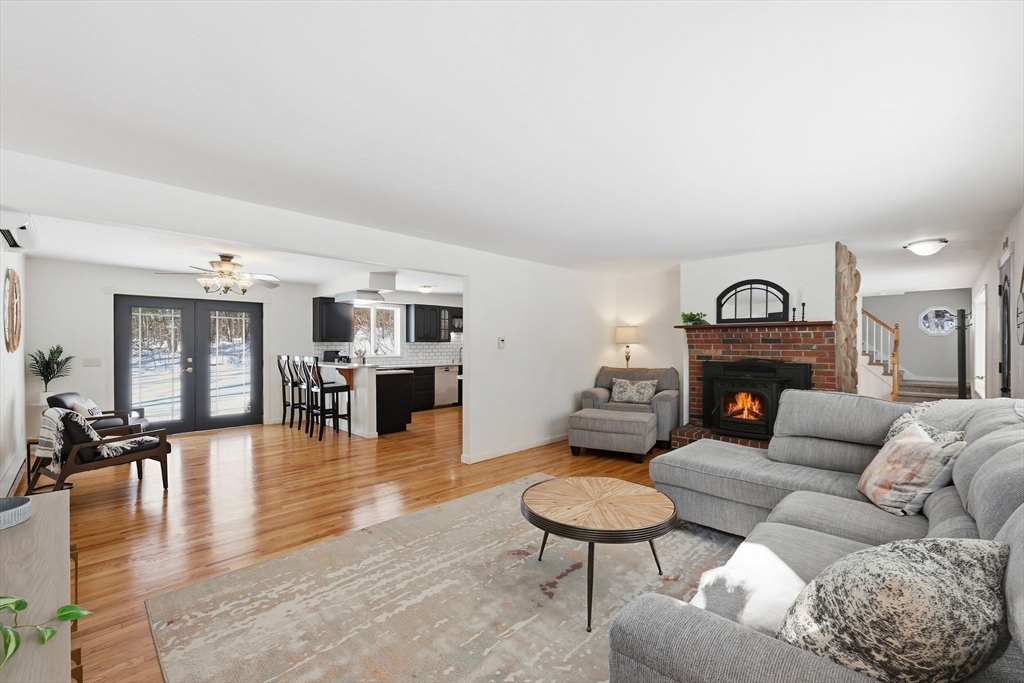 429 Moore Street Ludlow, MA 01056 - Photo 7 of 41 a living room with furniture kitchen view and a fireplace