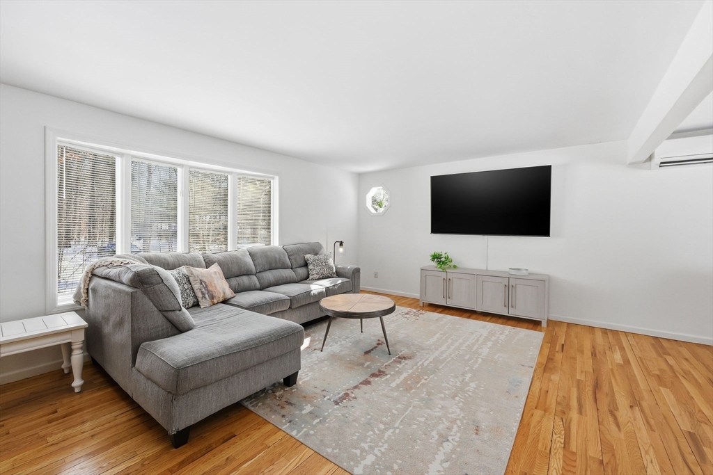 429 Moore Street Ludlow, MA 01056 - Photo 9 of 41 a living room with furniture and a flat screen tv
