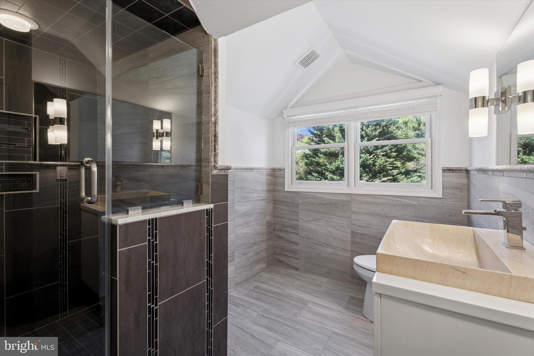317 Hilltop Road Paoli, PA 19301 - Photo 16 of 25 a bathroom with a sink and a large mirror