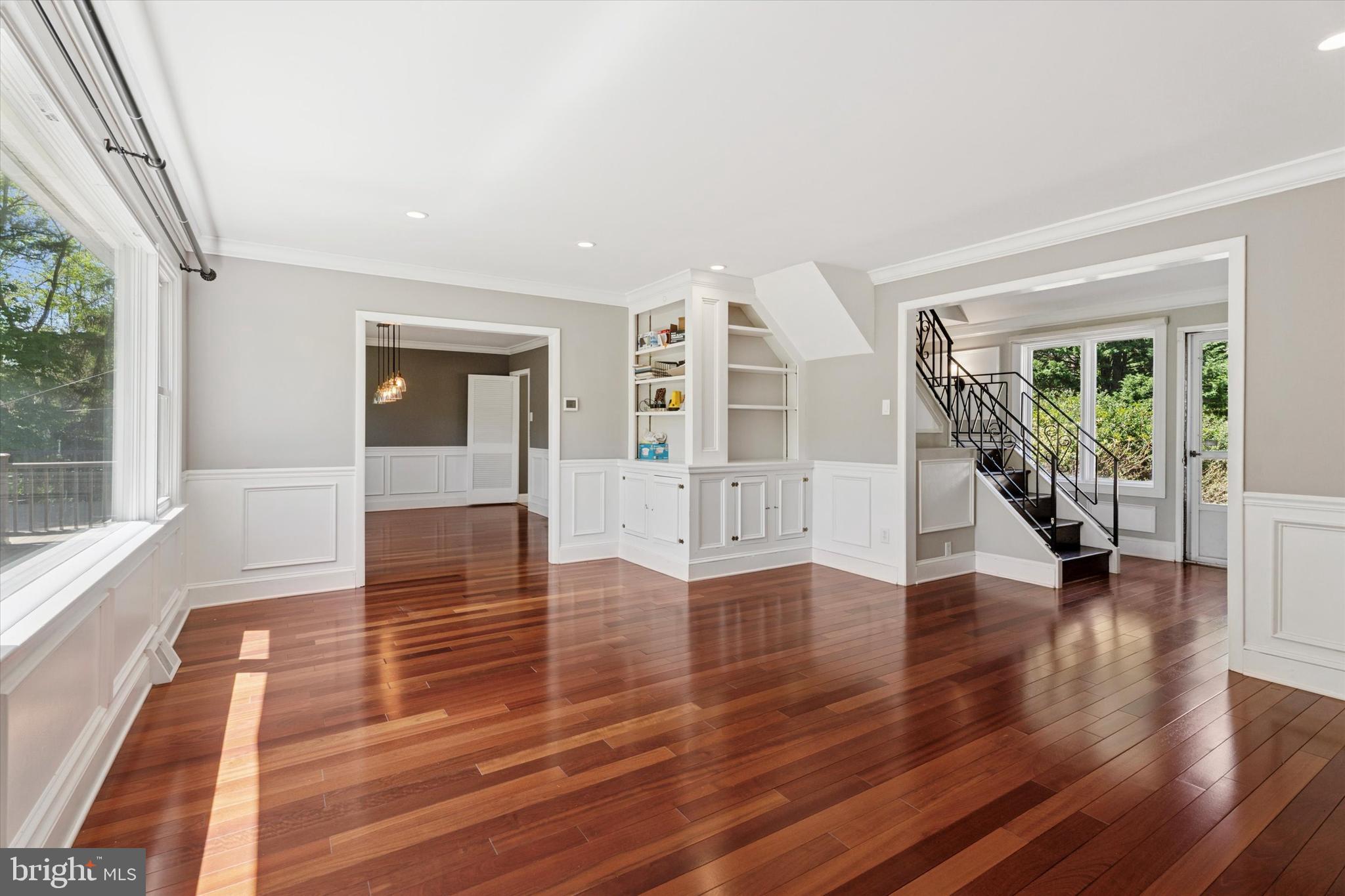 317 Hilltop Road Paoli, PA 19301 - Photo 8 of 25 a view of an entryway with wooden floor and windows