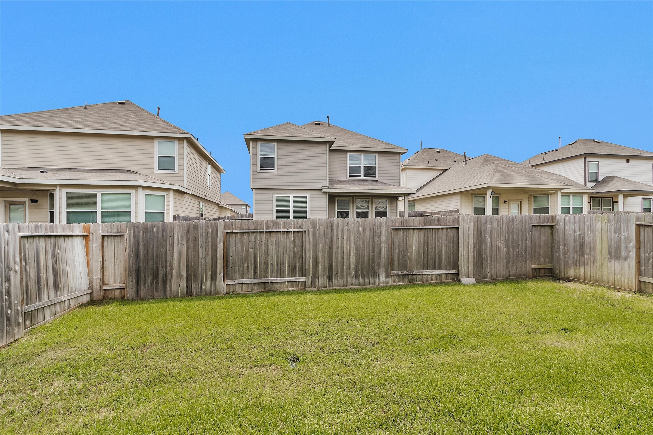 13534 Luke Prairie Willis, TX 77378 - Photo 27 of 29 Fenced in backyard.