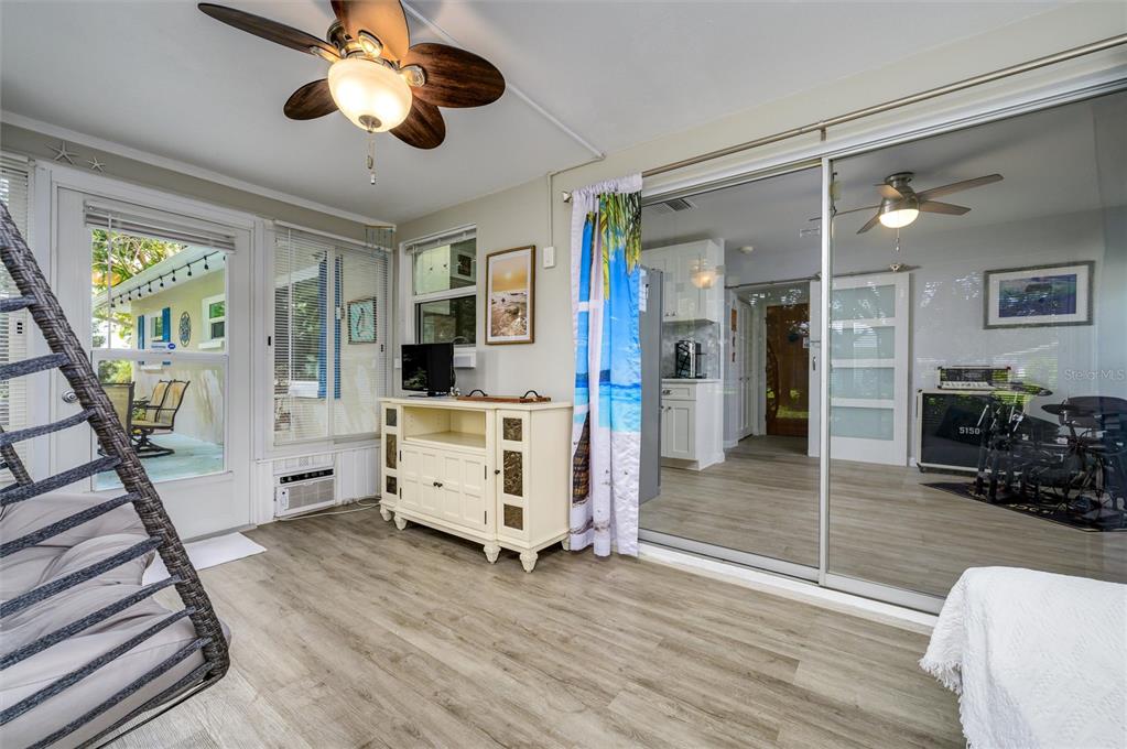 1472 Queen Anne Drive Palm Harbor, FL 34684 - Photo 24 of 34 a view of a livingroom with furniture a flat screen tv
