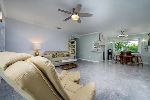 a bed room with a bed and a chair